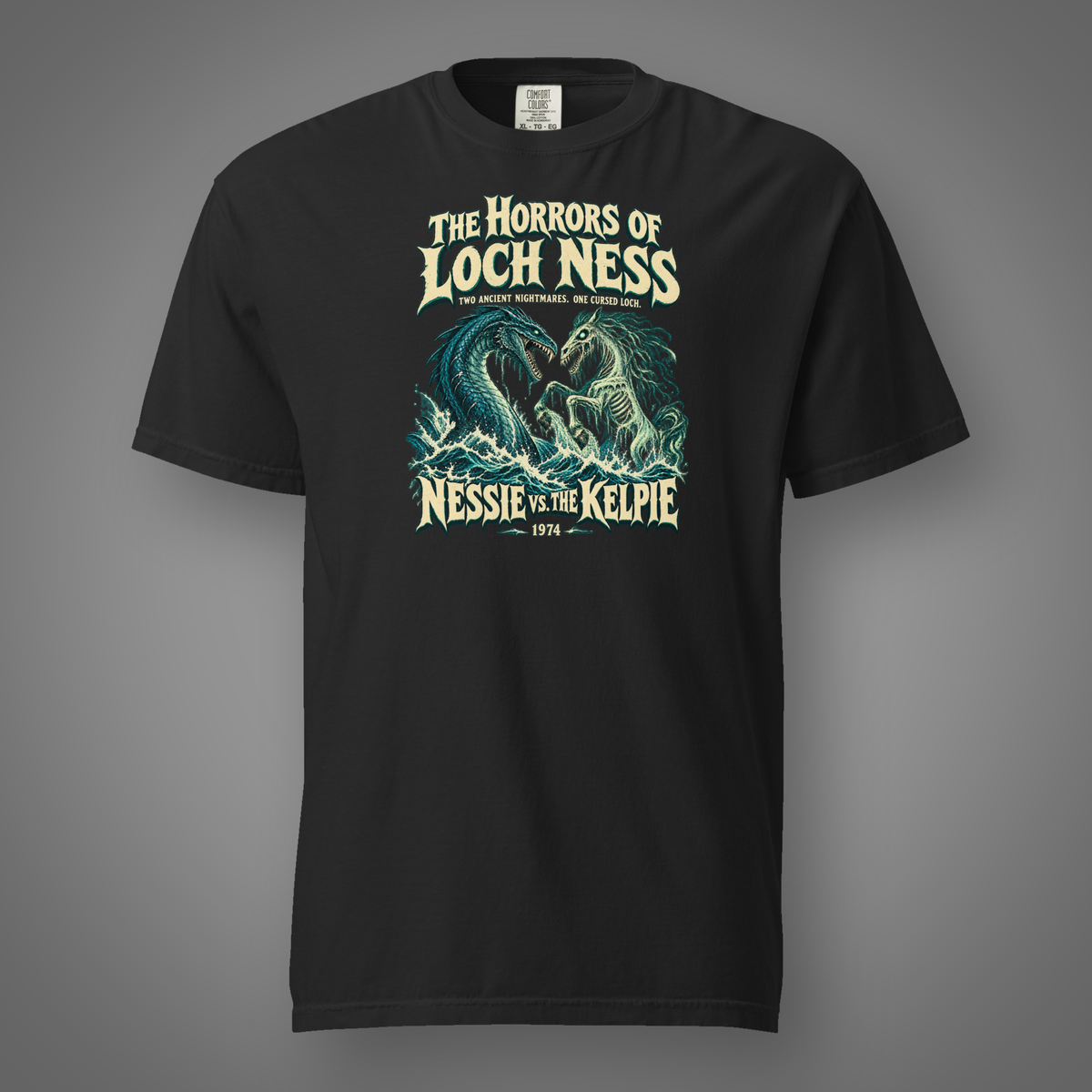 Nessie vs. The Kelpie front graphic on black heavyweight T-shirt — Candidate H gray studio